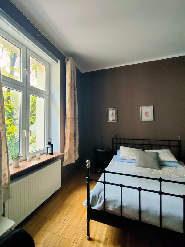 Bedroom with large window and natural light
